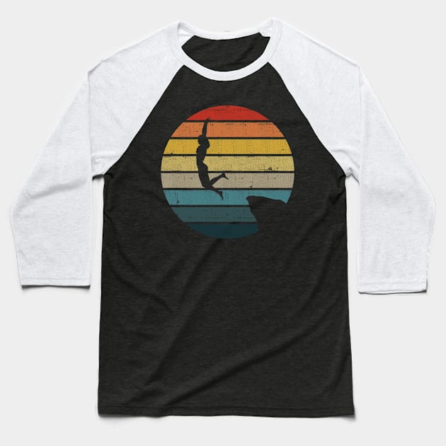 Cliff Diving Silhouette On A Distressed Retro Sunset graphic Baseball T-Shirt by theodoros20